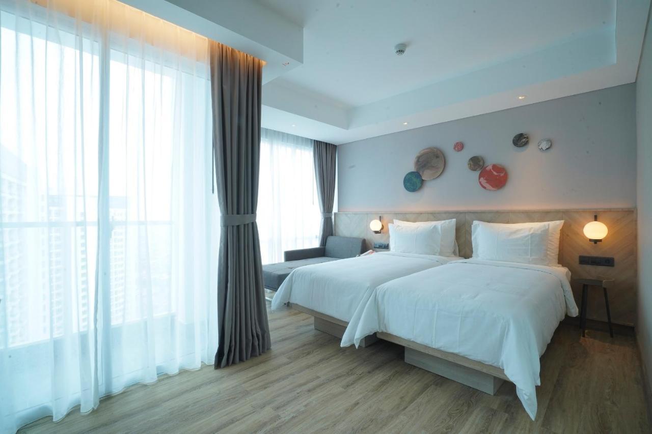 ג'קרטה Harris Suites Puri Mansion מראה חיצוני תמונה