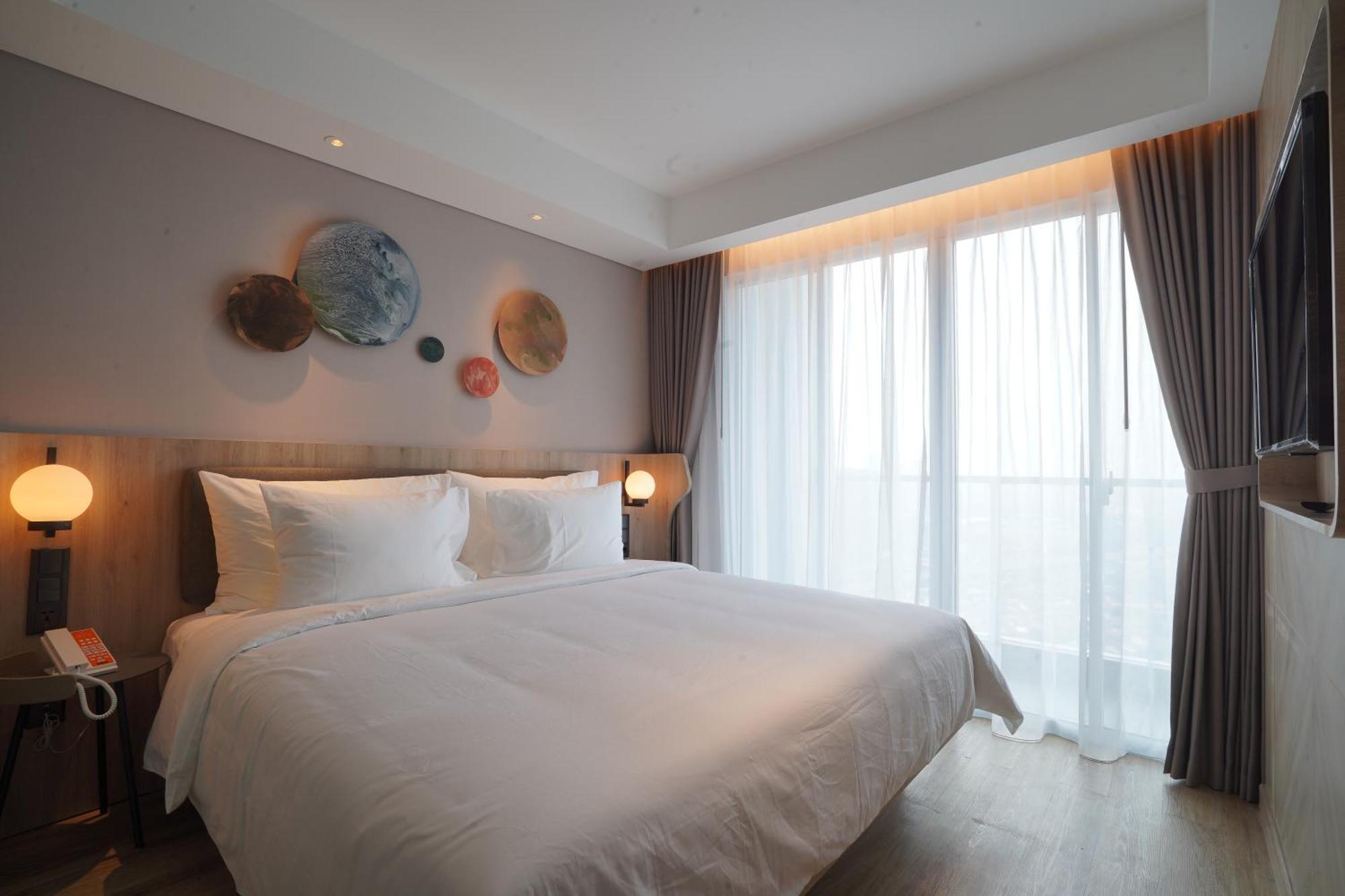 ג'קרטה Harris Suites Puri Mansion מראה חיצוני תמונה
